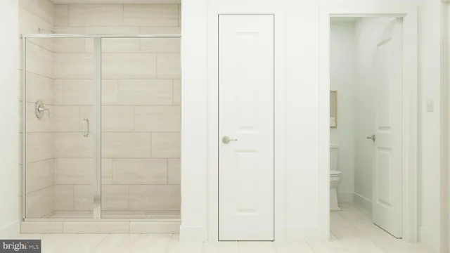 a view of livingroom with washer and dryer