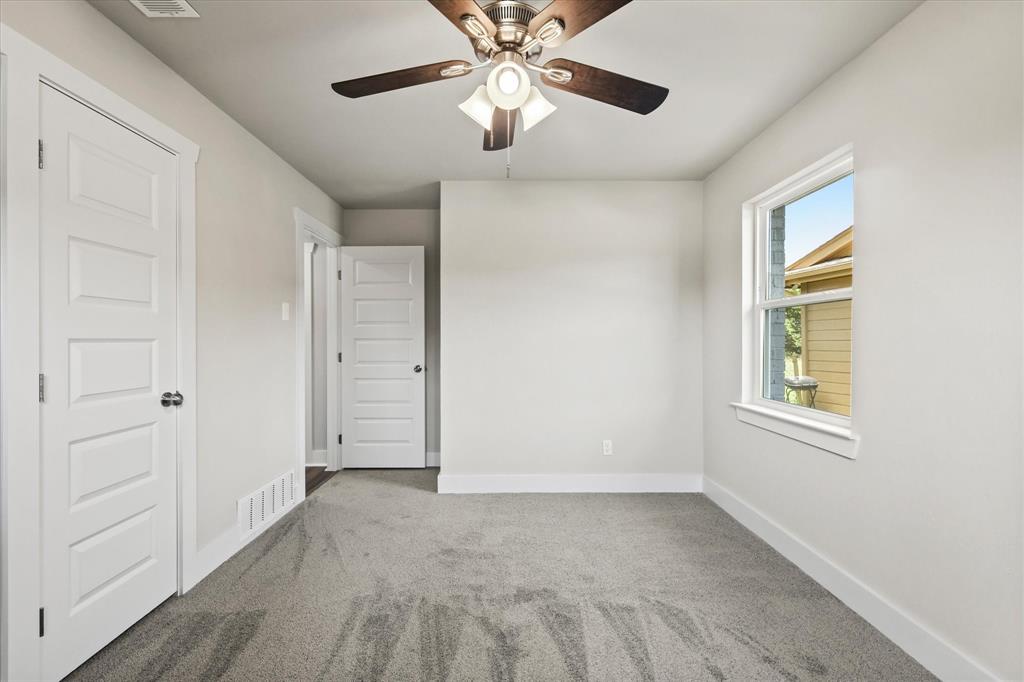5629 Maceo Lane Fort Worth, TX 76112 - Photo 13 of 25 a view of an empty room with a window