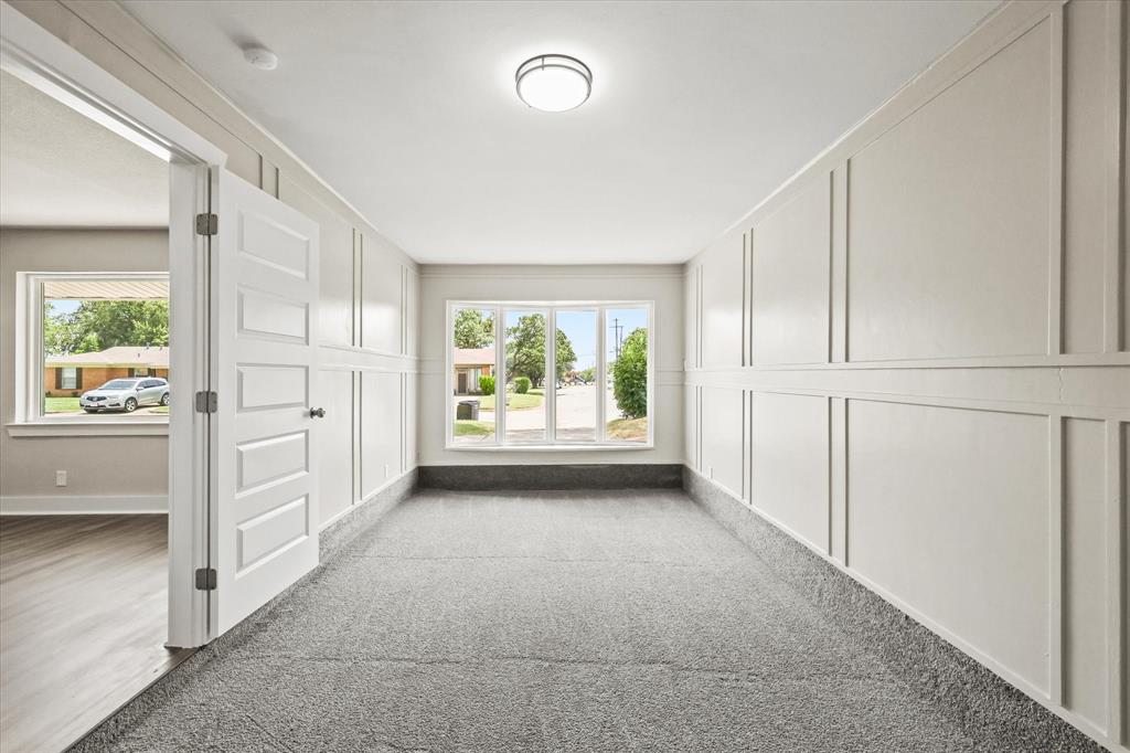 5629 Maceo Lane Fort Worth, TX 76112 - Photo 7 of 25 a view of a kitchen with an empty room and windows