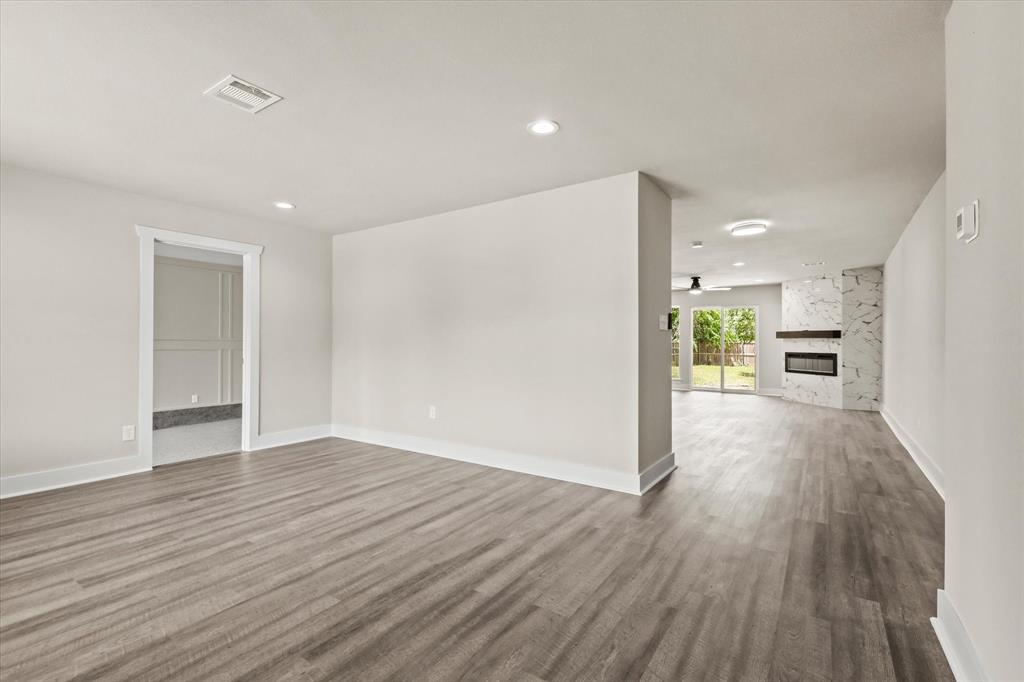 5629 Maceo Lane Fort Worth, TX 76112 - Photo 8 of 25 a view of empty room with wooden floor
