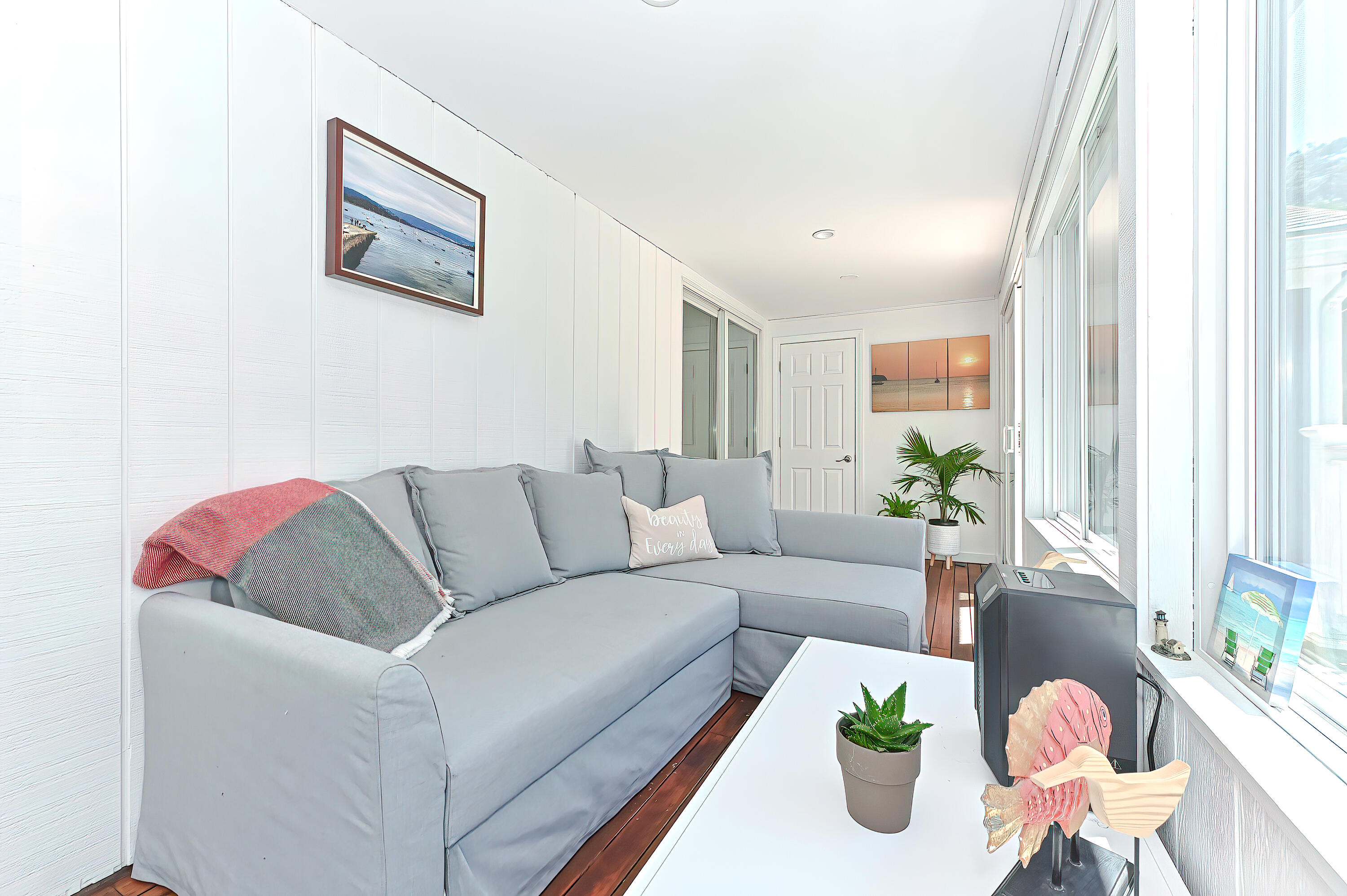 8 Cutlass Lane Mashpee, MA 02649 - Photo 17 of 93 a living room with furniture and a large window