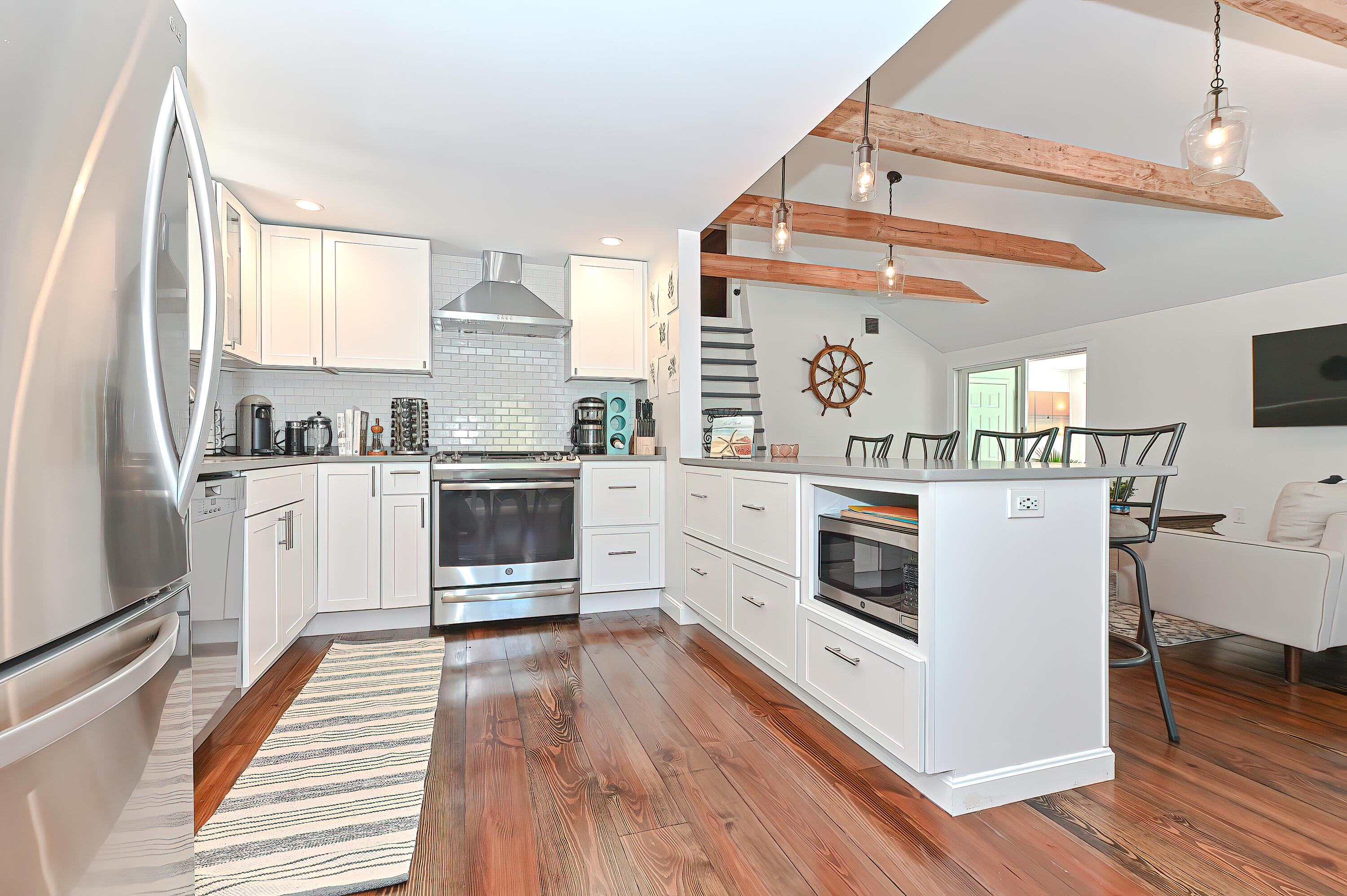 8 Cutlass Lane Mashpee, MA 02649 - Photo 2 of 93 a kitchen with stainless steel appliances a stove a sink and a refrigerator