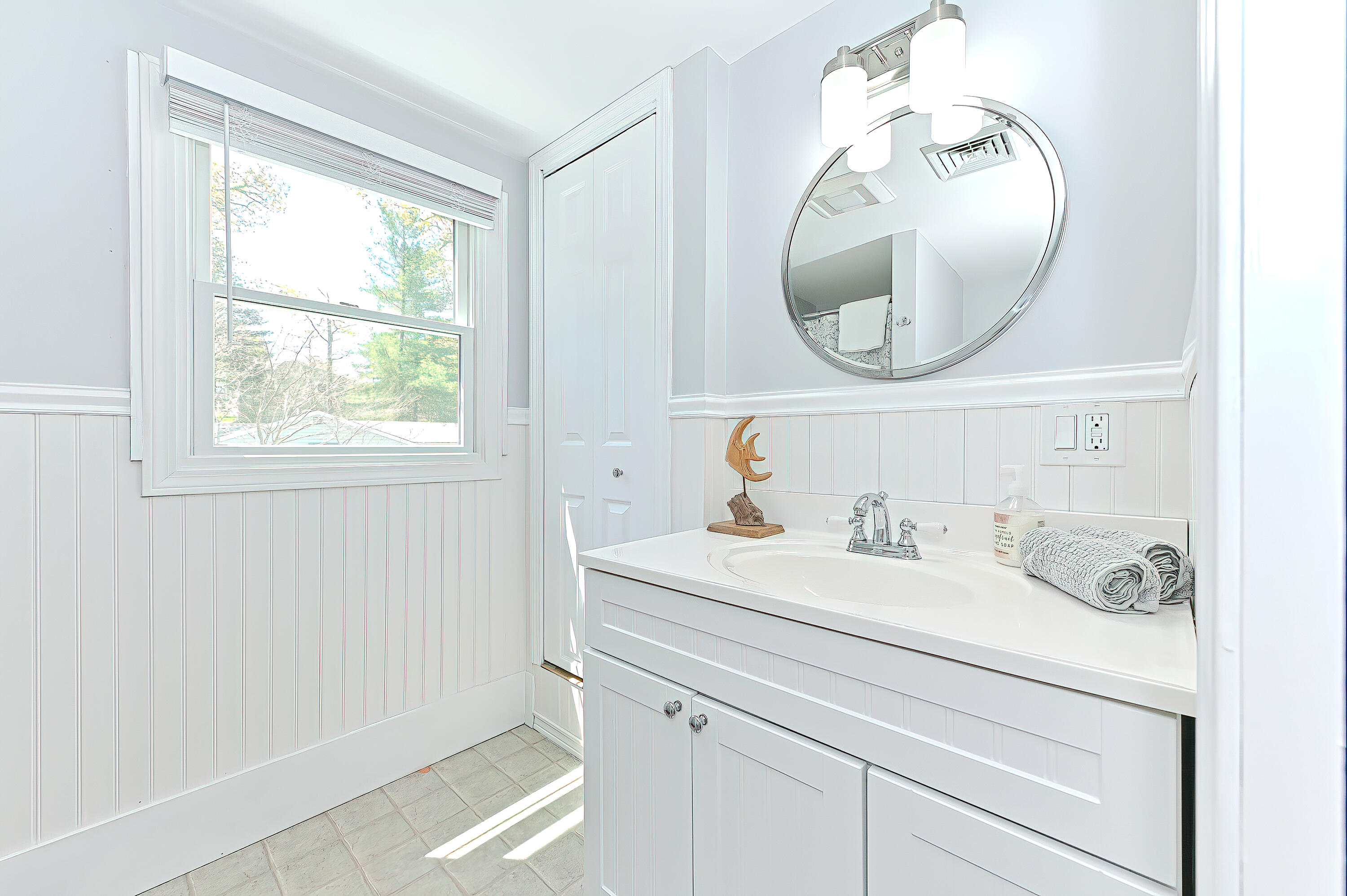 8 Cutlass Lane Mashpee, MA 02649 - Photo 29 of 93 a bathroom with a sink and a mirror