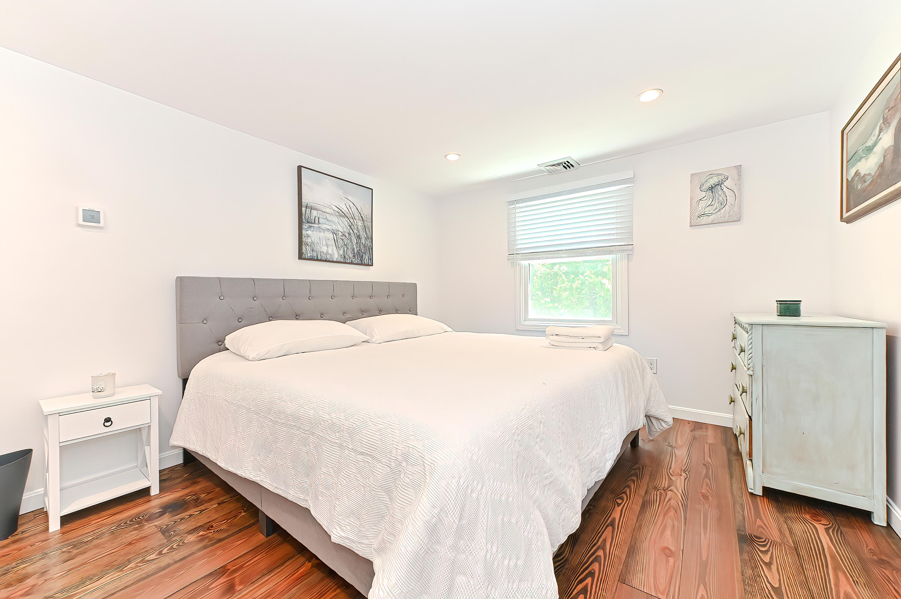 8 Cutlass Lane Mashpee, MA 02649 - Photo 33 of 93 a bedroom with a bed and a night stand