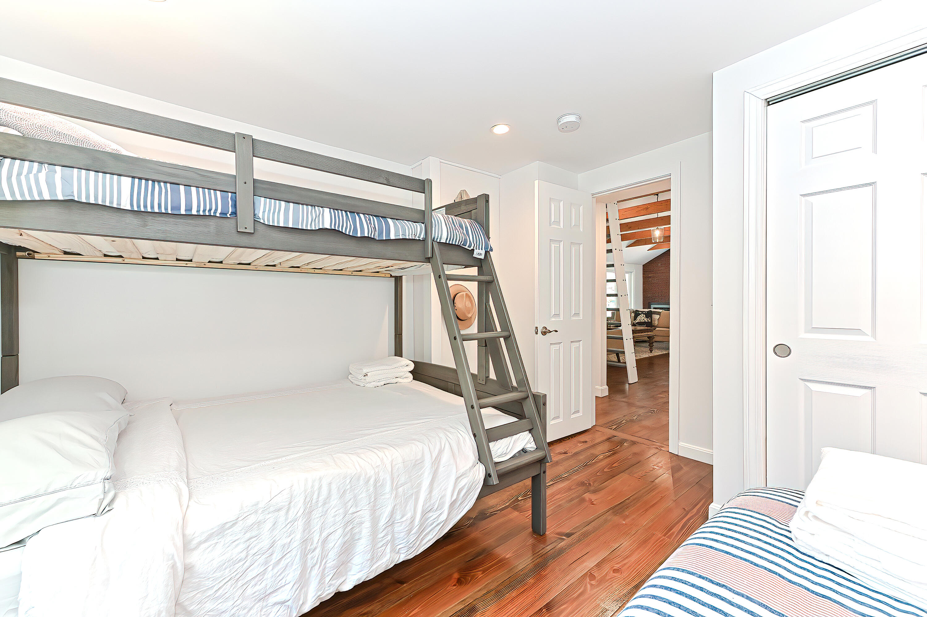 8 Cutlass Lane Mashpee, MA 02649 - Photo 36 of 93 a bedroom with a bed and wooden floor