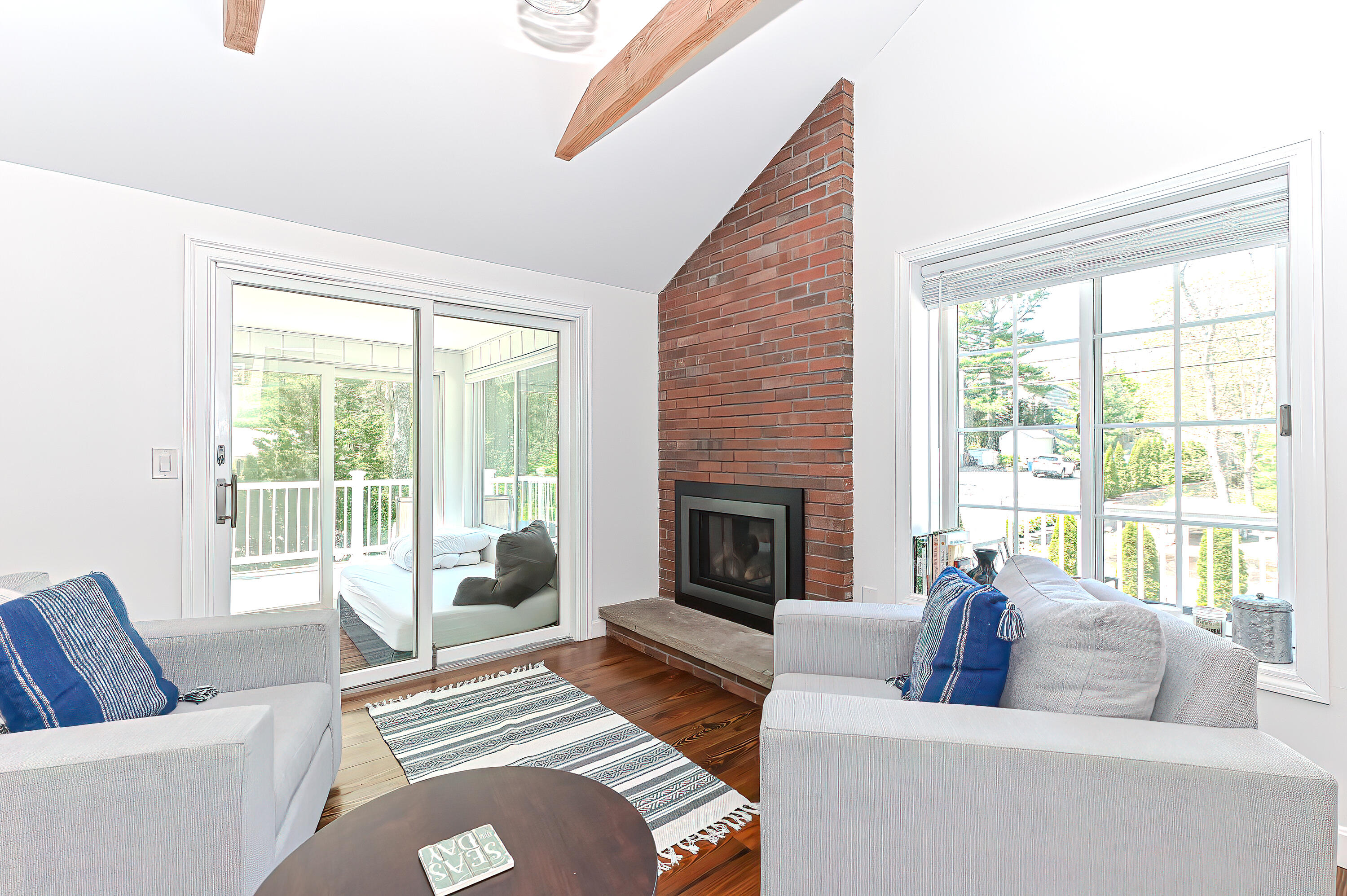 8 Cutlass Lane Mashpee, MA 02649 - Photo 54 of 93 a living room with furniture and a fireplace