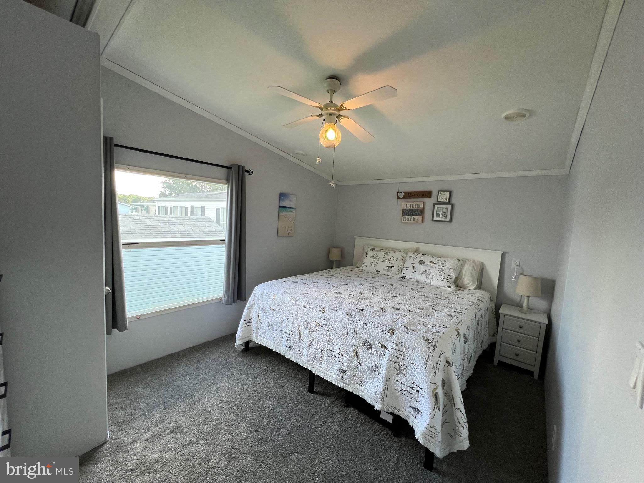 8339 Longboat Way South Berlin, MD 21811 - Photo 6 of 92 a bedroom with a bed and a window