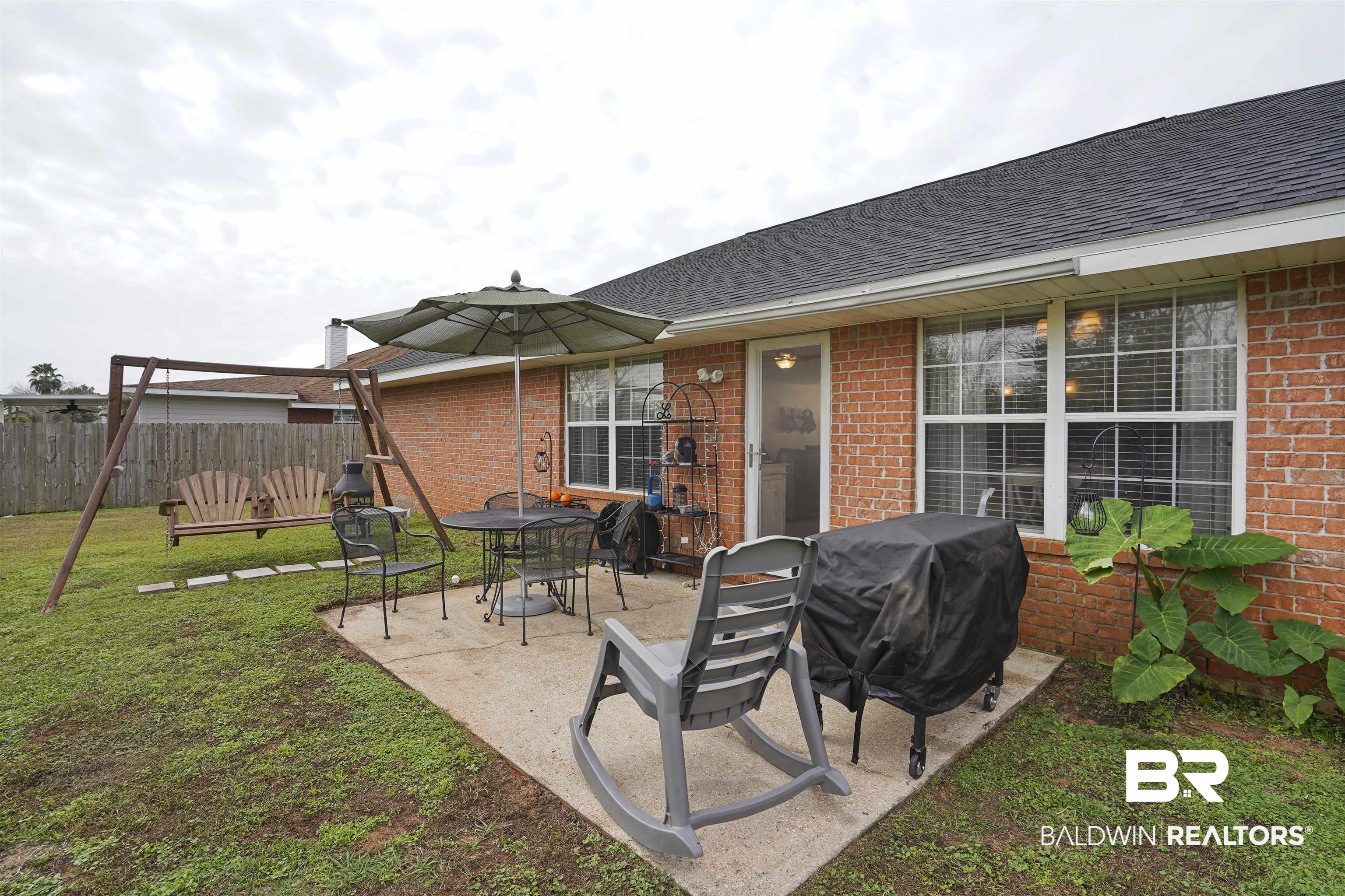224 Meadow Run Loop Foley, AL 36535 - Photo 29 of 36 Back Patio