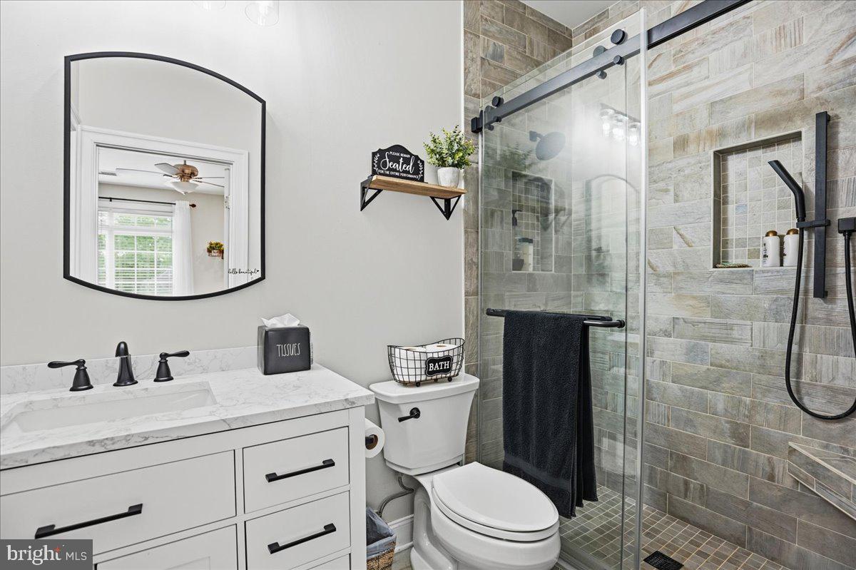 4100 Hidden Creek Road Port Republic, MD 20676 - Photo 57 of 99 Beautiful bathroom with custom tiled shower