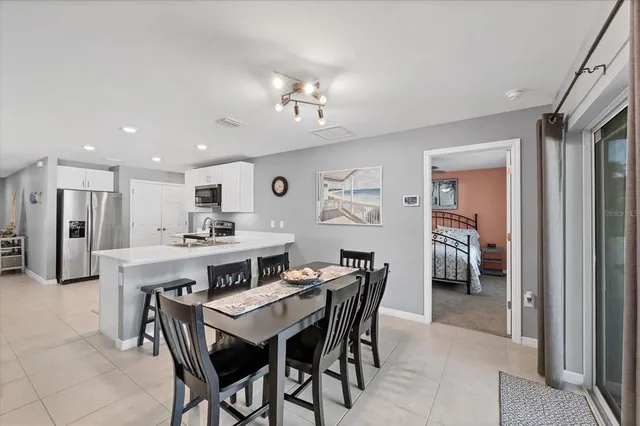 a view of a dining room with furniture