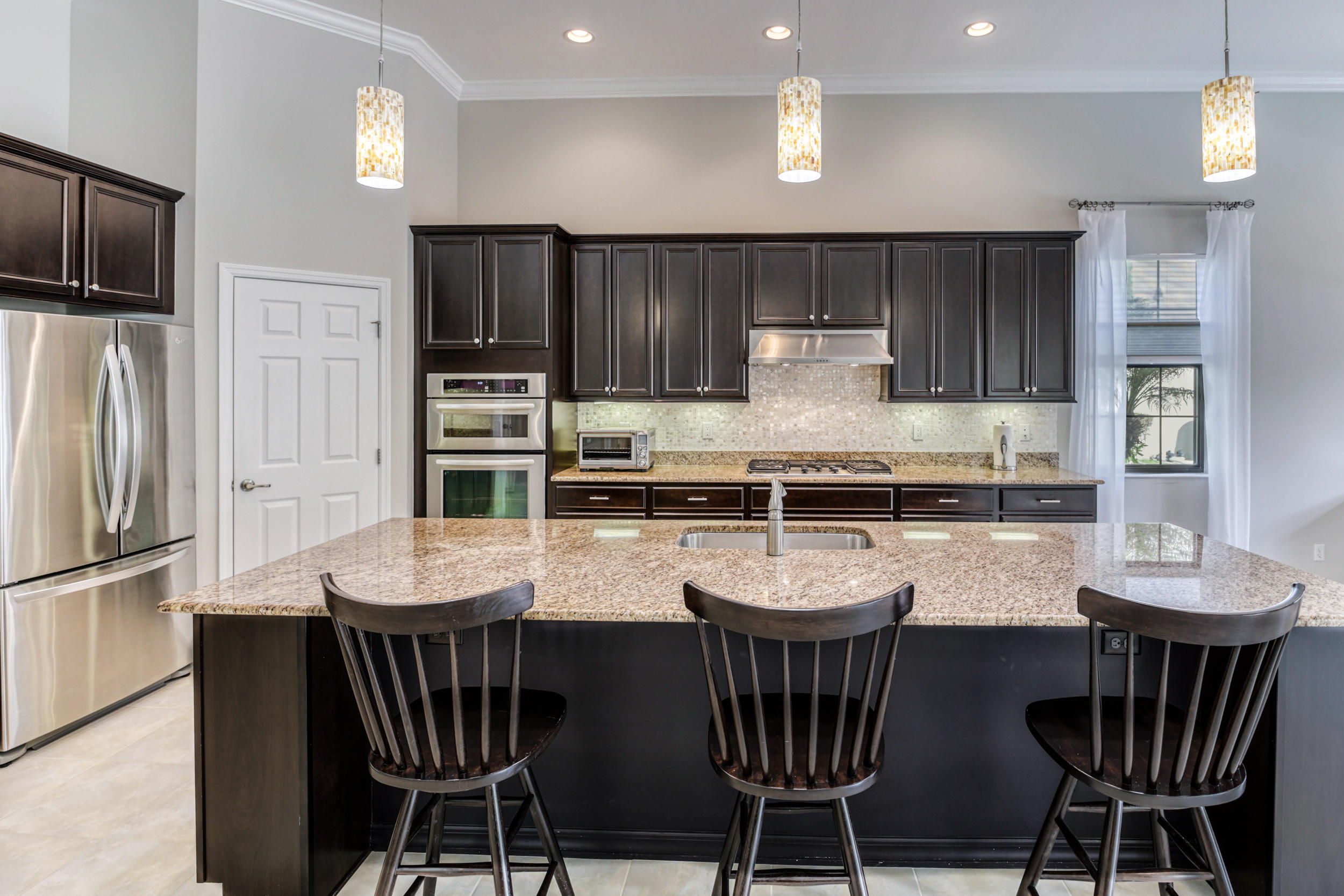 10375 Pisa Road Wellington, FL 33414 - Photo 15 of 79 kitchen island