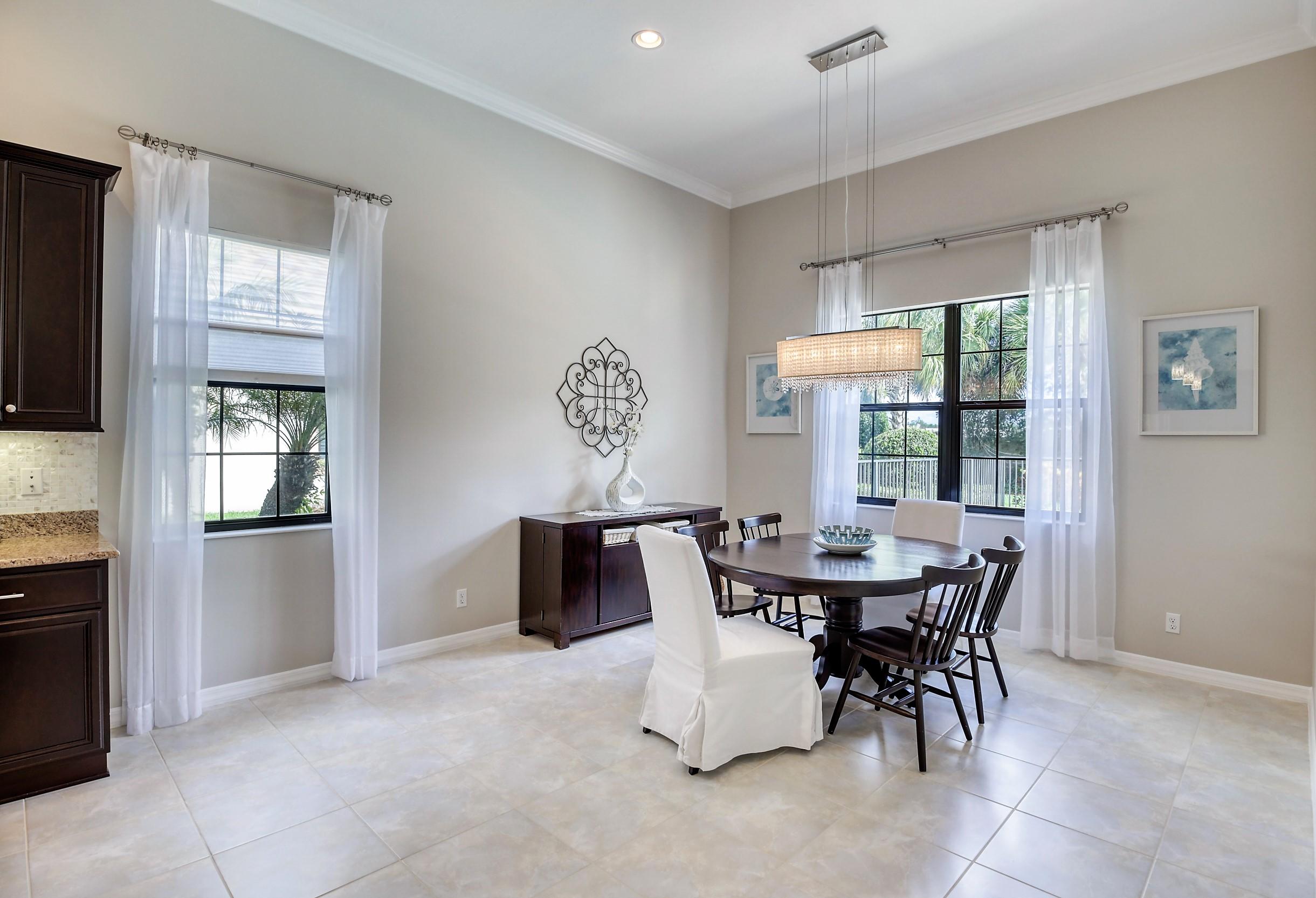 10375 Pisa Road Wellington, FL 33414 - Photo 19 of 79 formal dining area