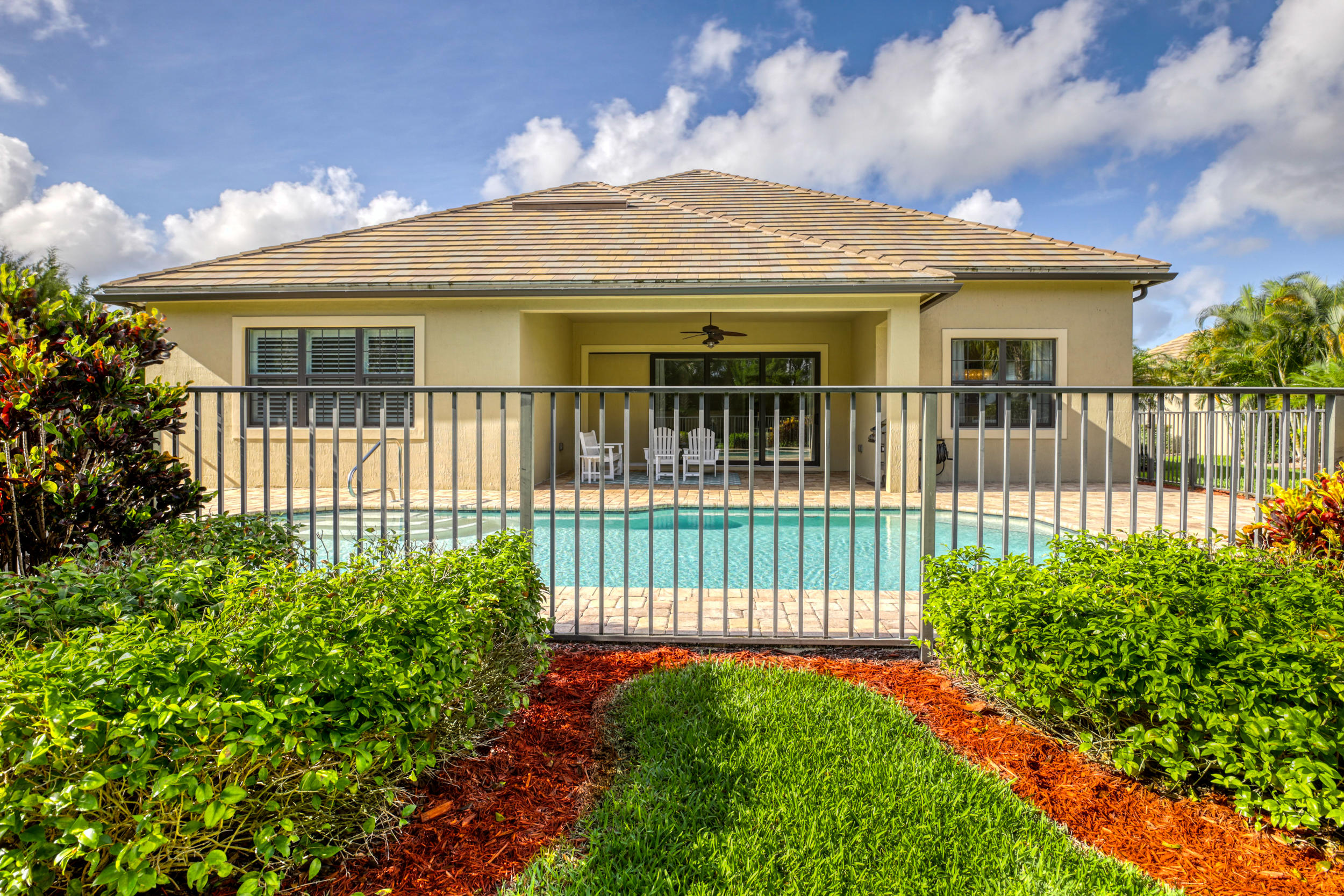 10375 Pisa Road Wellington, FL 33414 - Photo 49 of 79 rear view of home & pool
