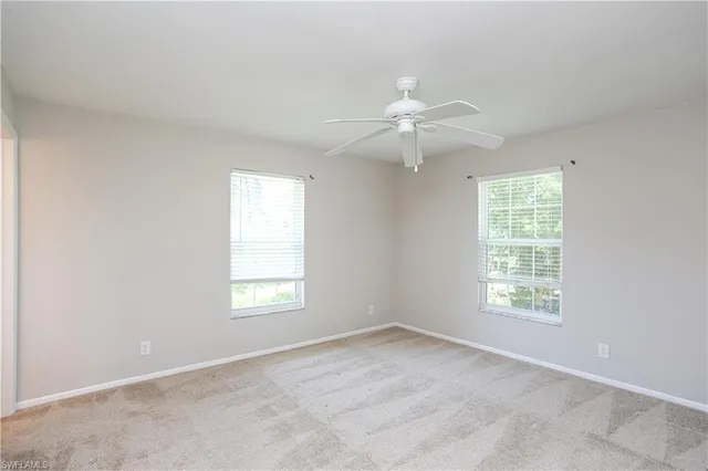 an empty room with a bathroom