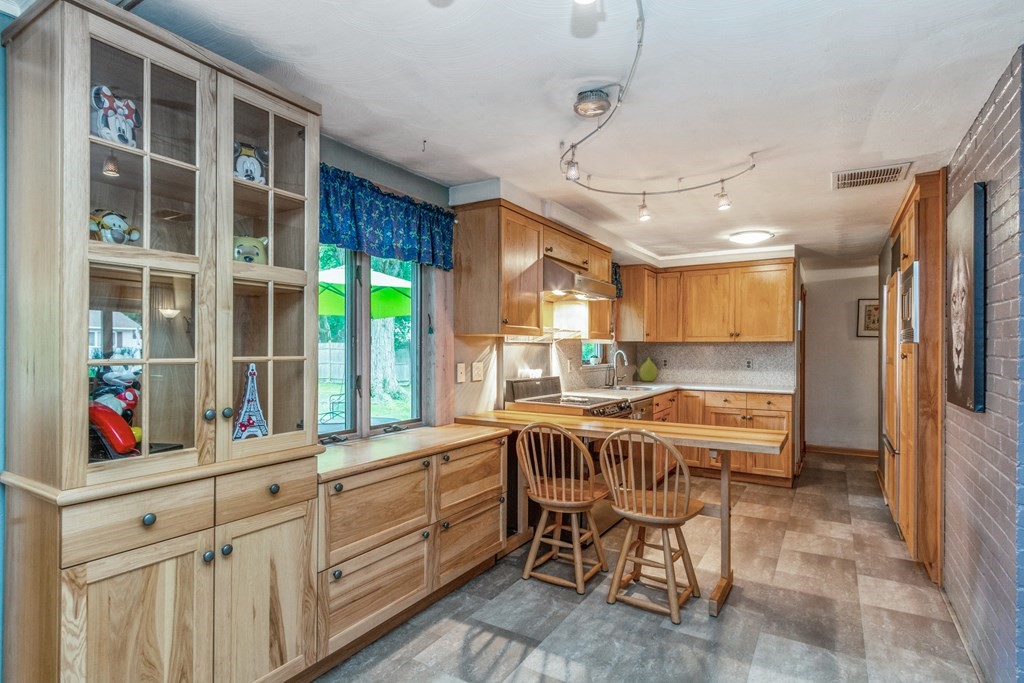 96 Simpson Drive Framingham, MA 01701 - Photo 12 of 35 a view of a kitchen and dining room