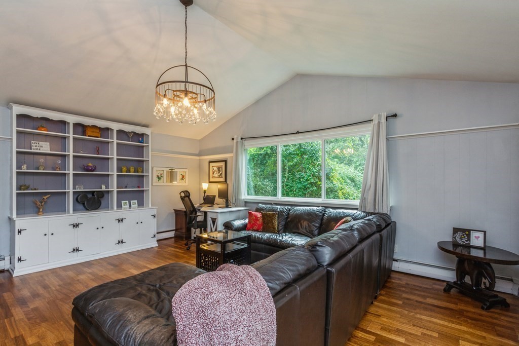 96 Simpson Drive Framingham, MA 01701 - Photo 19 of 35 a living room with furniture windows and wooden floor