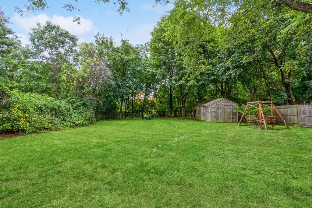 96 Simpson Drive Framingham, MA 01701 - Photo 29 of 35 a fire hydrant in the middle of a field