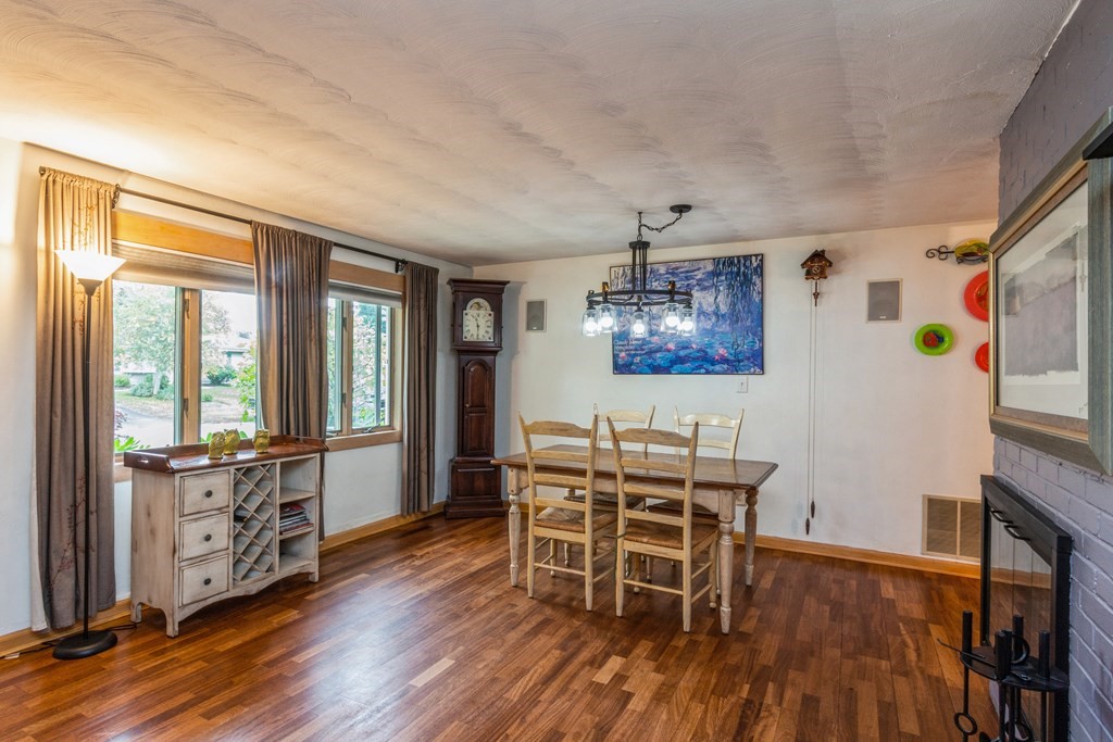 96 Simpson Drive Framingham, MA 01701 - Photo 5 of 35 a dining room with furniture a window and wooden floor