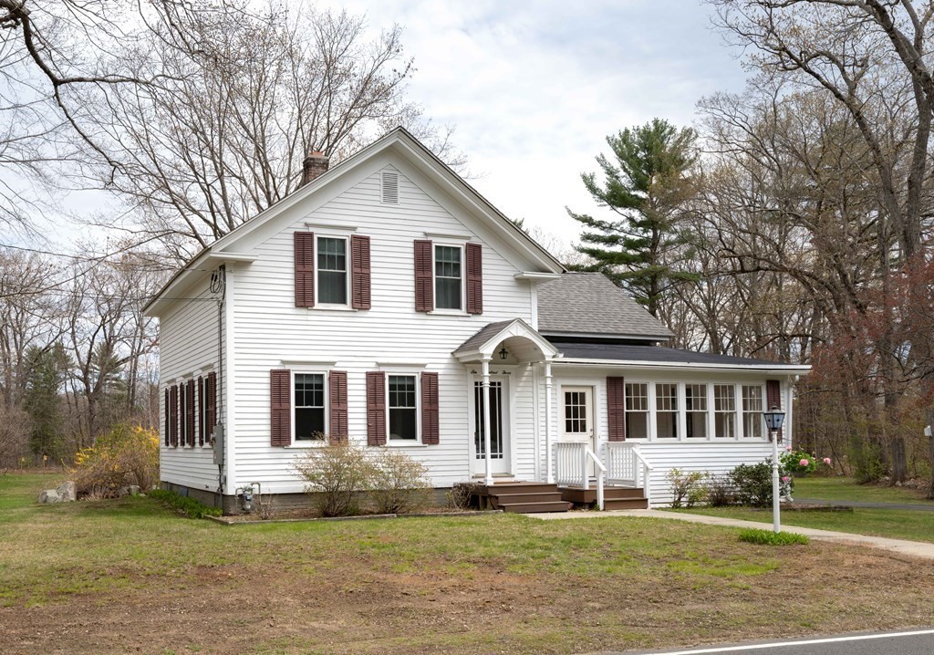 603 Spring Street Northampton, MA 01053 - Photo 1 of 38 a front view of a house with a yard