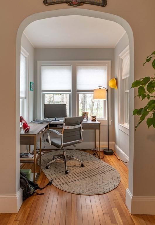 603 Spring Street Northampton, MA 01053 - Photo 20 of 38 a view of a workspace with furniture and a window