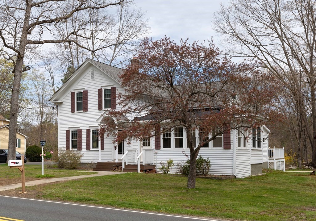 603 Spring Street Northampton, MA 01053 - Photo 2 of 38 a front view of a house with a yard