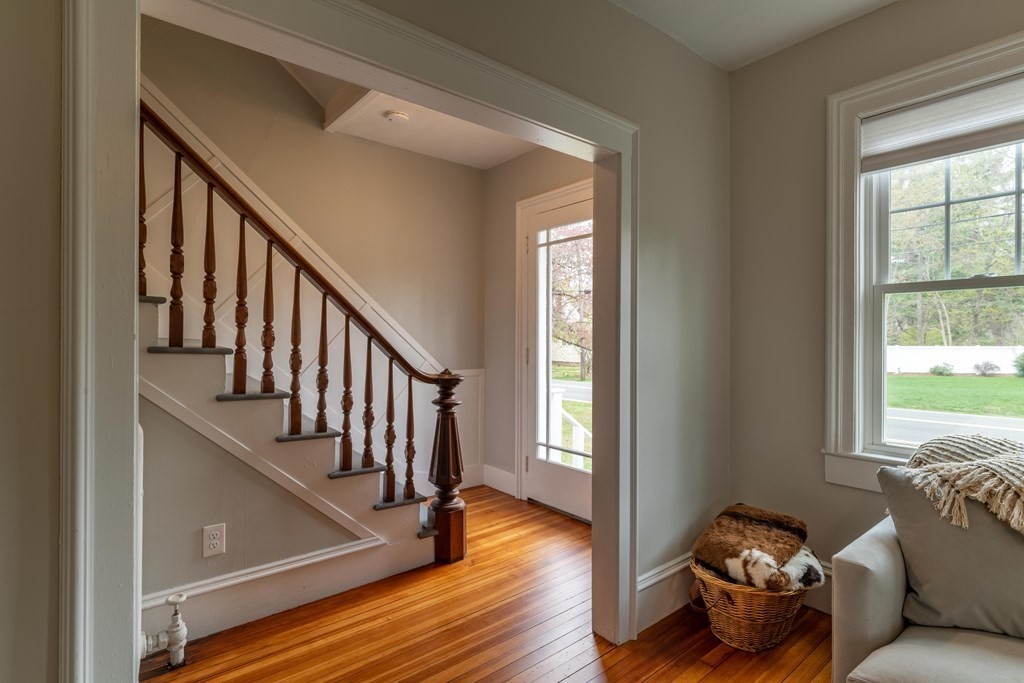 603 Spring Street Northampton, MA 01053 - Photo 23 of 38 a living room with wooden floor and windows