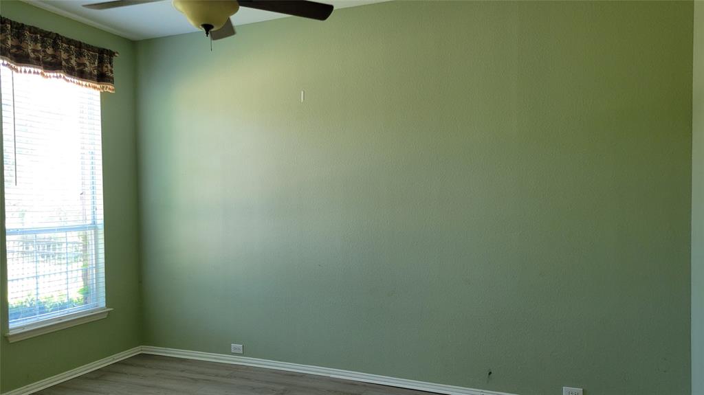 2400 Spillway Circle Frisco, TX 75036 - Photo 2 of 21 an empty room with a window
