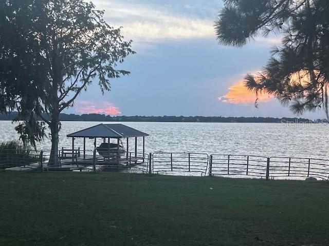 25800 Washington Street Astatula, FL 34705 - Photo 14 of 14 a view of a lake with a yard