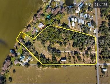 25800 Washington Street Astatula, FL 34705 - Photo 6 of 14 an aerial view of a house