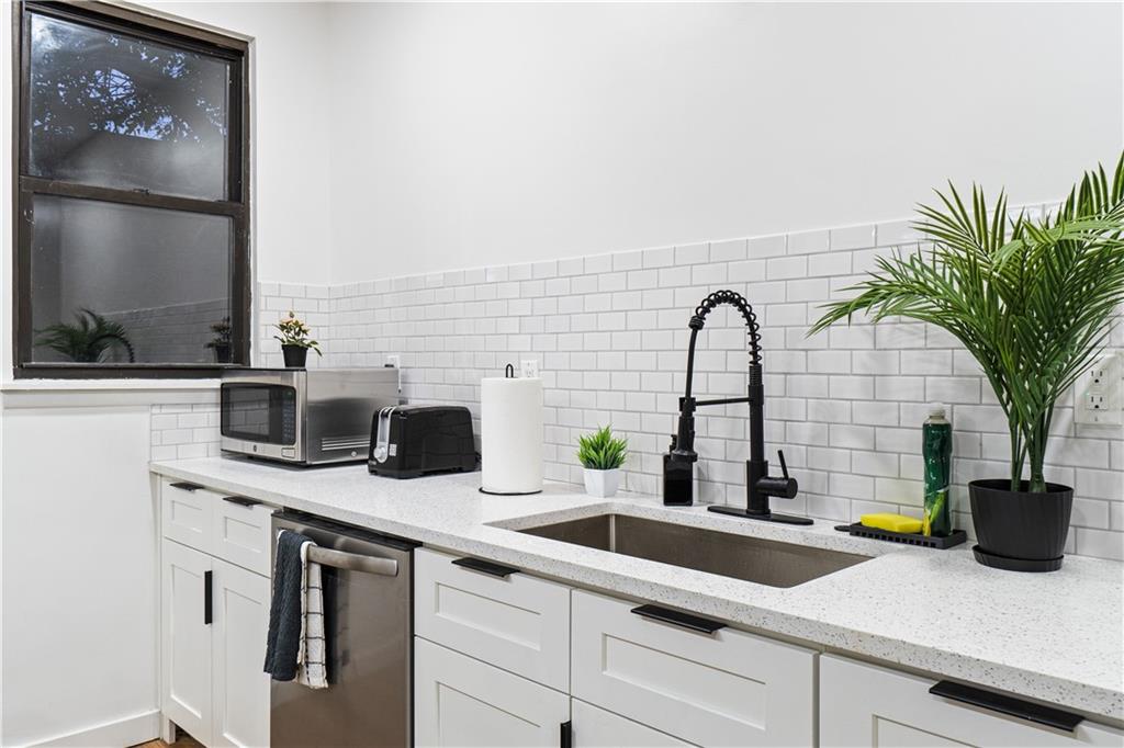 525 Alpine Avenue Pittsburgh, PA 15212 - Photo 13 of 26 A big under mounted sink, with a pull down faucet, and a dishwasher too - washing dishes should be more of a breeze.
