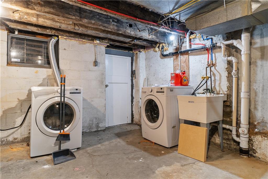 525 Alpine Avenue Pittsburgh, PA 15212 - Photo 24 of 26 Lower level designed for practicality — laundry, storage, and extra room to keep life organized.