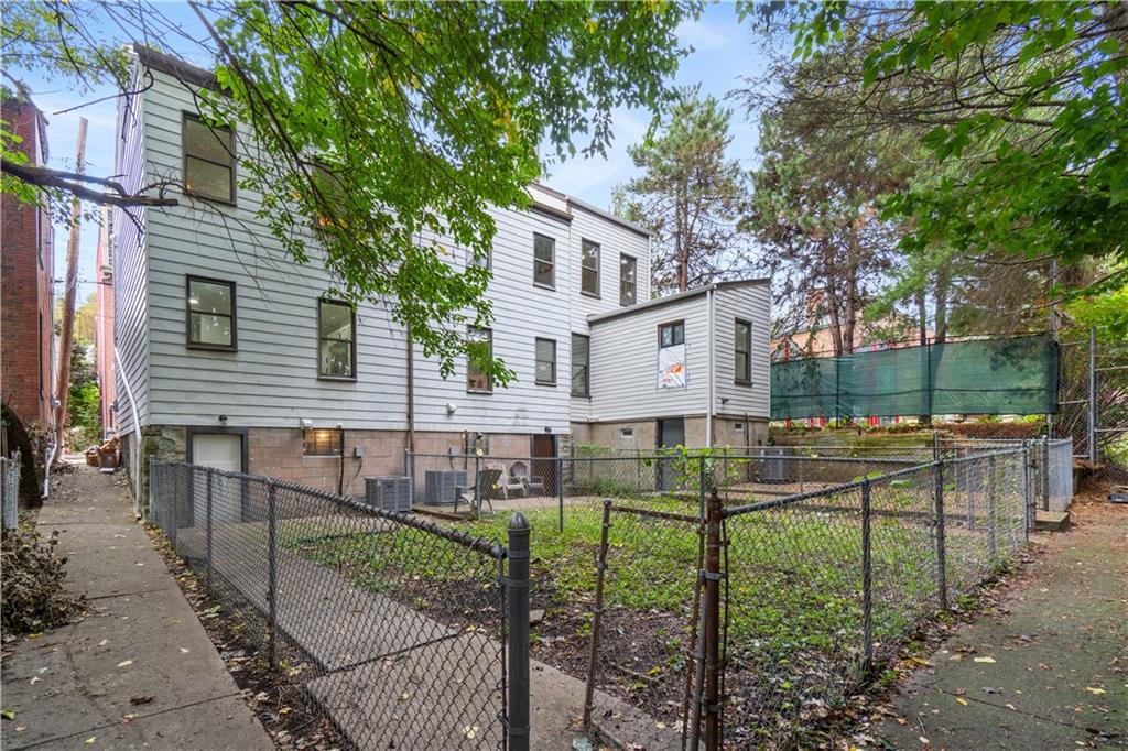 525 Alpine Avenue Pittsburgh, PA 15212 - Photo 26 of 26 A charming fenced yard — perfect for morning coffee, fresh air, or simple outdoor downtime.