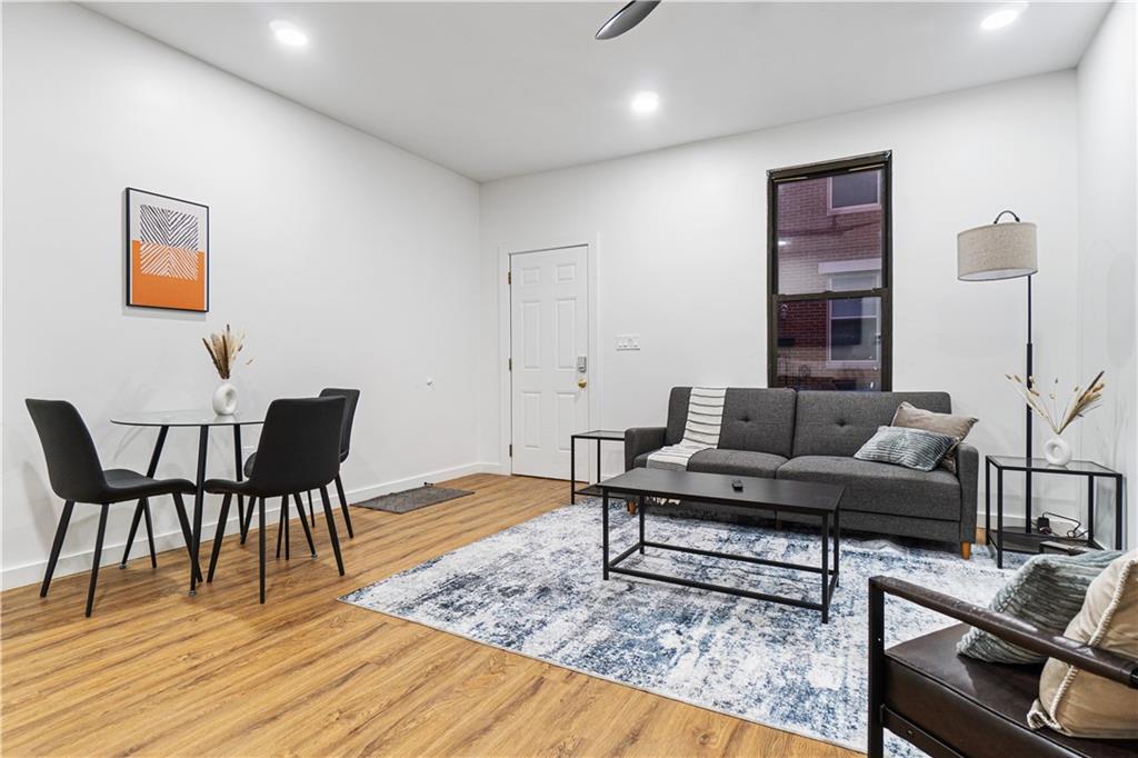 525 Alpine Avenue Pittsburgh, PA 15212 - Photo 5 of 26 Comfortable, open concept living space that makes spending time with friends and family feel easy and enjoyable.