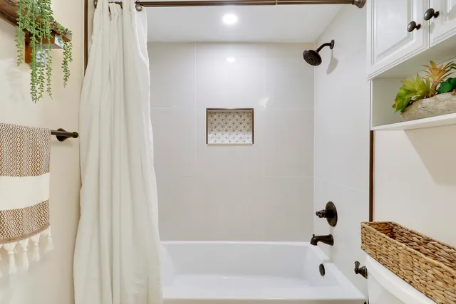 a bathroom with a bathtub