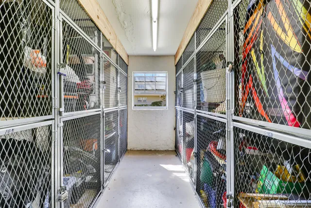 an aerial view of a house with a garden and swimming pool
