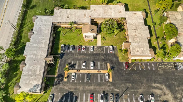 a view of a car parked in front of a house
