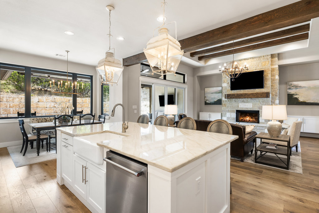 4746 R O Drive Spicewood, TX 78669 - Photo 18 of 40 a large kitchen with a table and chairs