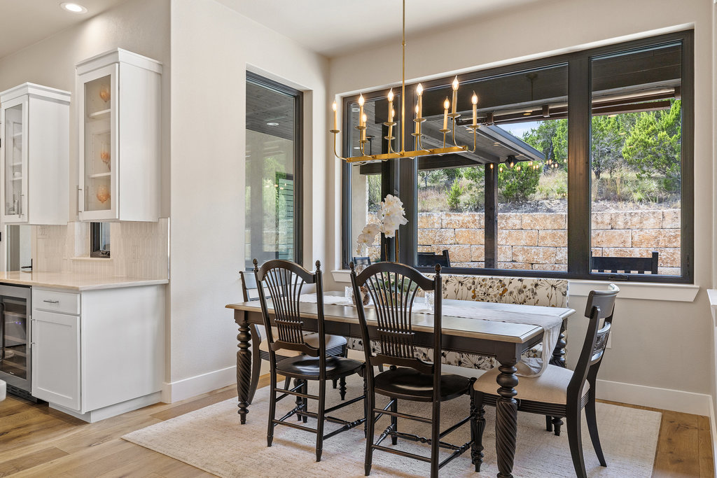4746 R O Drive Spicewood, TX 78669 - Photo 21 of 40 a view of a dining room with furniture window and outside view