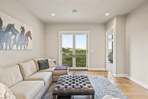 a living room with furniture and a window