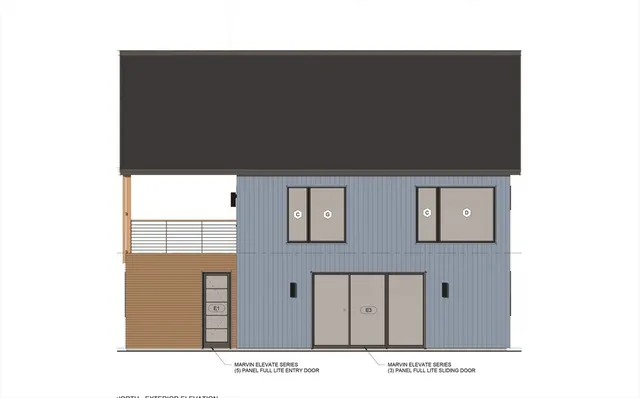 a black and white photo of a living room