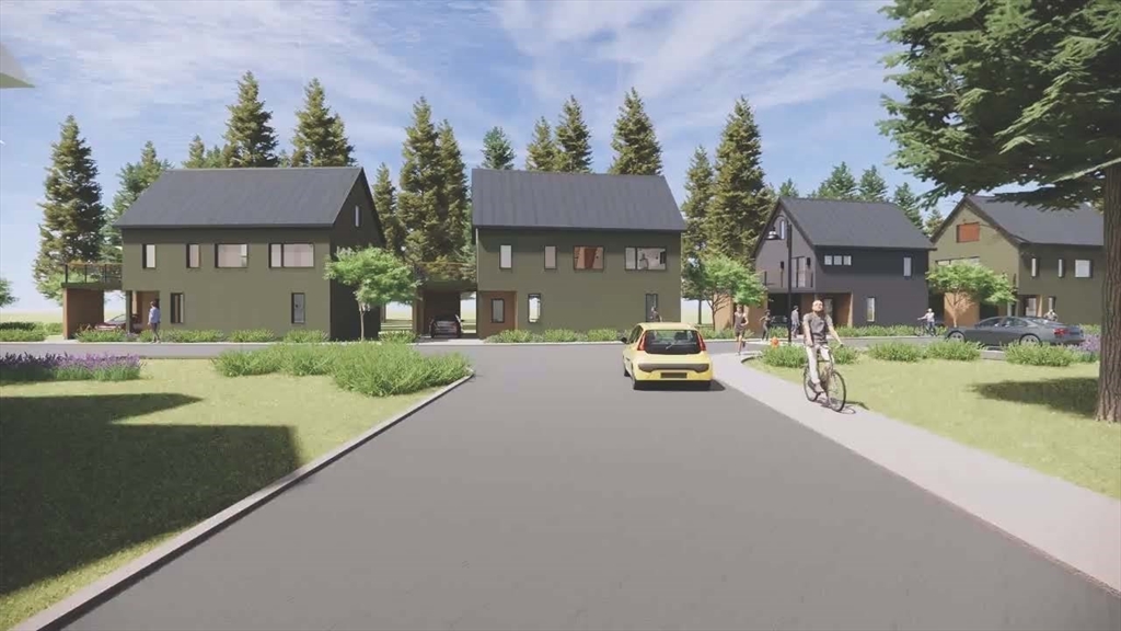 8 View Avenue, Unit B Northampton, MA 01060 - Photo 7 of 8 a city street lined with buildings and a yard