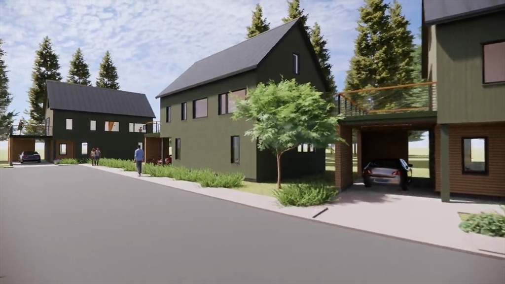 8 View Avenue, Unit B Northampton, MA 01060 - Photo 8 of 8 a view of a brick house with a yard and plants