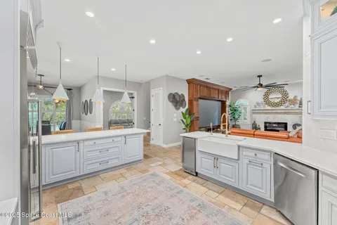 a view of a livingroom with furniture window and wooden floor