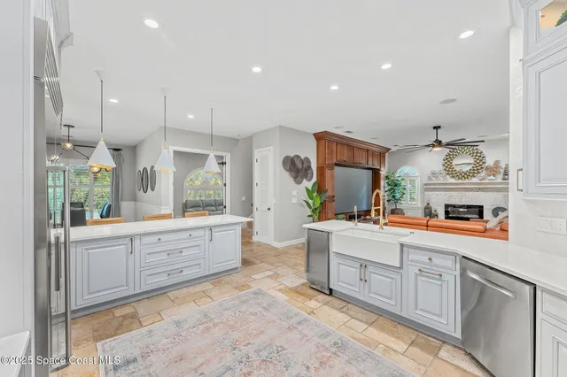 a view of a livingroom with furniture window and wooden floor