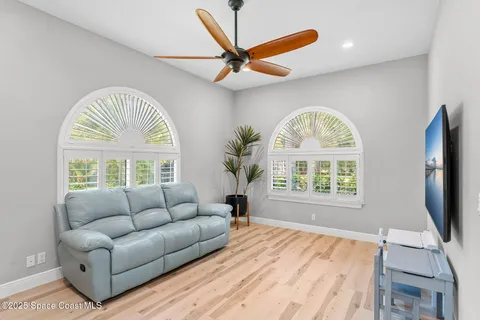 a bathroom with a double vanity sink mirror and shower