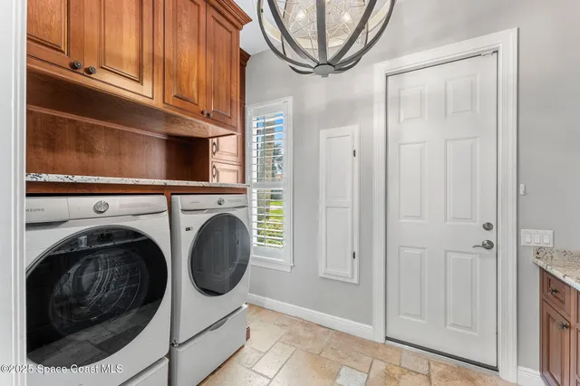 a spacious bathroom with a tub sink and mirror