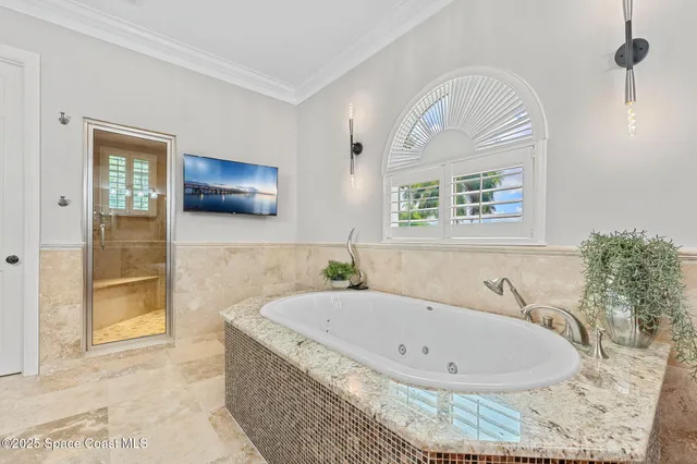 a swimming pool with yard in front of it