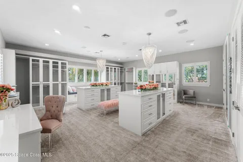 a view of a yard and a swimming pool