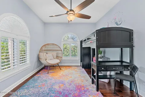 an aerial view of a house with a garden