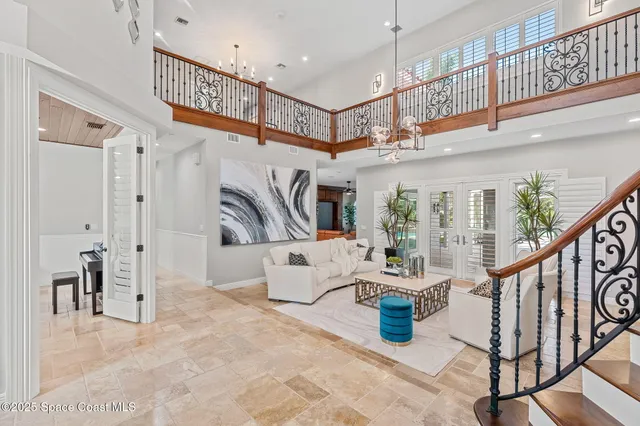 a large kitchen with lots of counter space and furniture